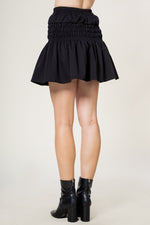Elastic waist smocked mini skirt