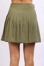 Wrapped solid tennis skirt