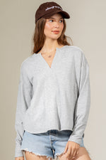 Raw edge detail solid knit top