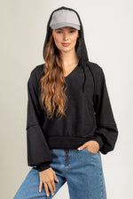 Raglan sleeve hooded knit top