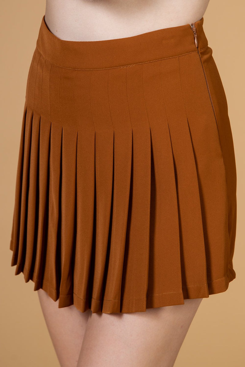 Pleated solid mini skirt